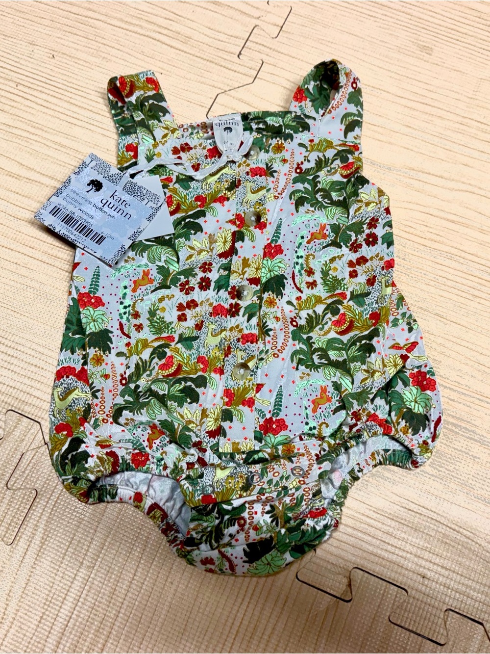 Kate Quinn baby girl floral romper “Goldilocks Morning Woods” print fall colors